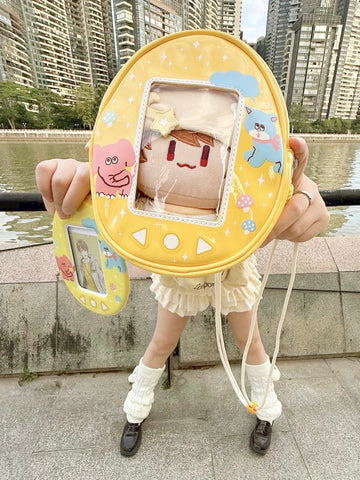 ［SWIMMER］コラボ 海外限定痛 たまごっち型 痛バッグ【YE36VH】